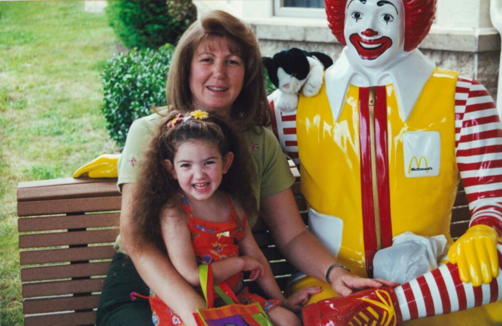 Shannon and Mom Outside Ronald McDonald House (Note, she propped a cat on Ronalds shoulder) 'JPEG